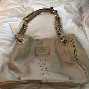 Gorgeous tan and gold purse.